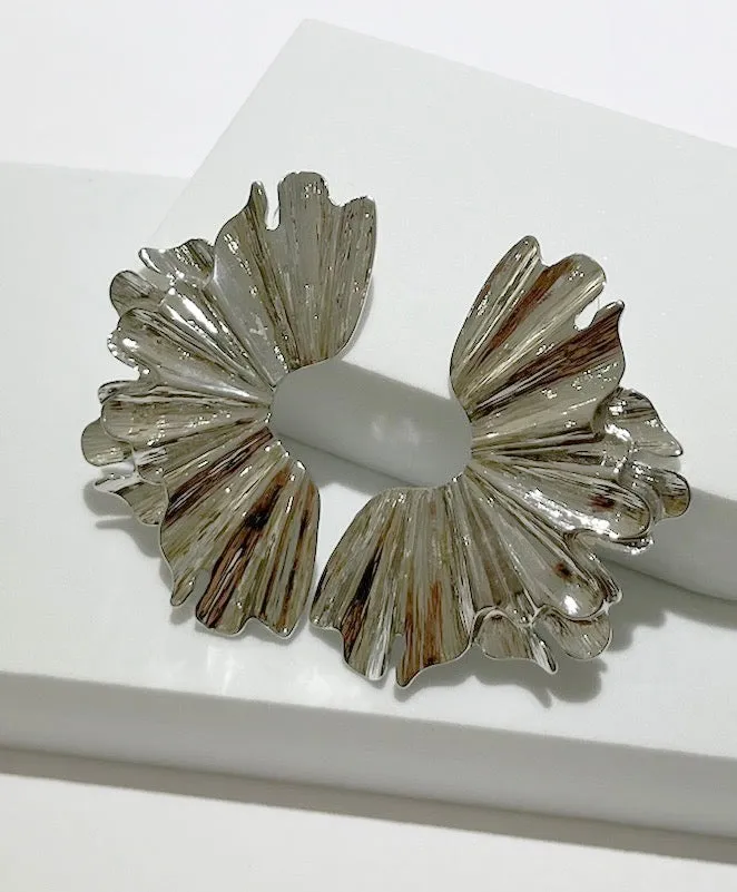 What a Statement Piece Silver Earrings